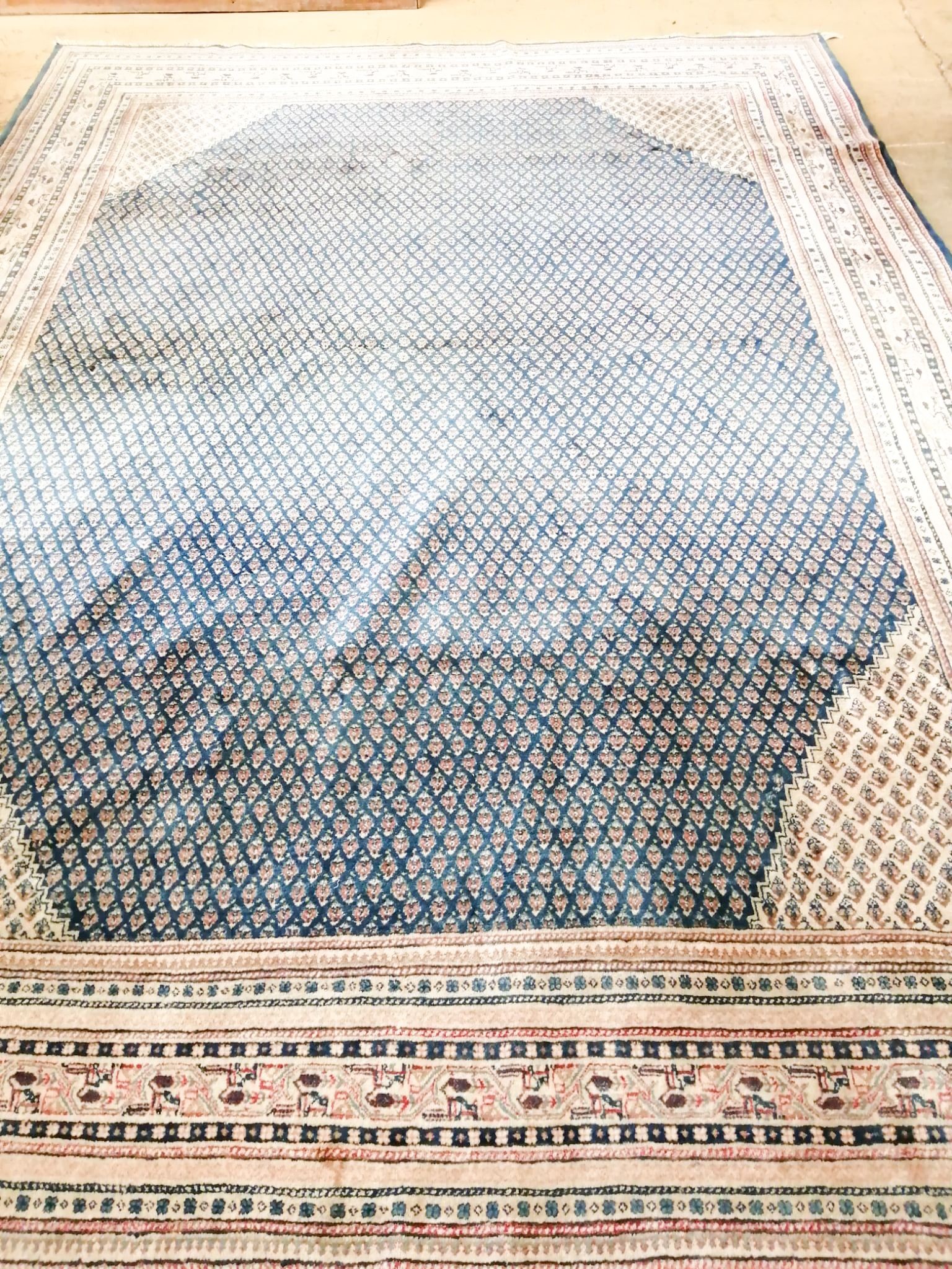 A Tabriz blue ground carpet